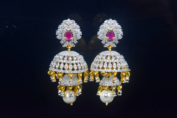 Buy online Rose Gold Plated Ad Studded Bell Shaped Handcrafted Jhumka  Earring from fashion jewellery for Women by Saraf Rs Jewellery for ₹1349 at  70% off | 2024 Limeroad.com