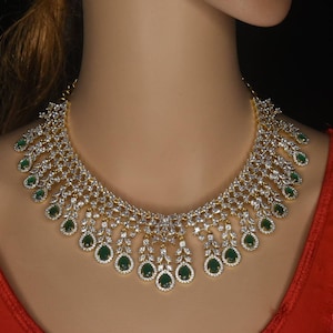 Indian   diamond finished American diamond necklace with earrings pressing style back By Asp Fashion