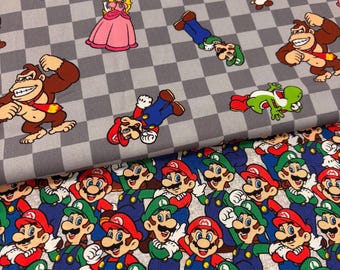 May include: Fabric featuring a grey and white checkered pattern with printed characters including Mario, Luigi, Princess Peach, Donkey Kong, Toad, and Yoshi. A second layer of fabric displays a dense, repeating pattern of Mario and Luigi figures.