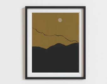 May include: A framed print of a minimalist landscape with a black silhouette of mountains against a mustard yellow background with a white circle in the upper right corner.