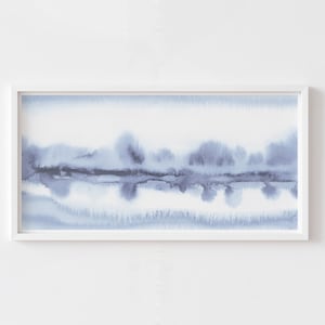 May include: A framed abstract watercolor painting with a blue and white color scheme. The painting features a horizontal band of blue watercolor with a hazy, blurred effect.