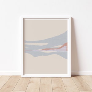 Puede incluir: Impresi&oacute;n de arte abstracto con un fondo beige y formas azules y rosadas. Las formas est&aacute;n superpuestas y crean una sensaci&oacute;n de profundidad. La impresi&oacute;n est&aacute; enmarcada en un marco blanco.
