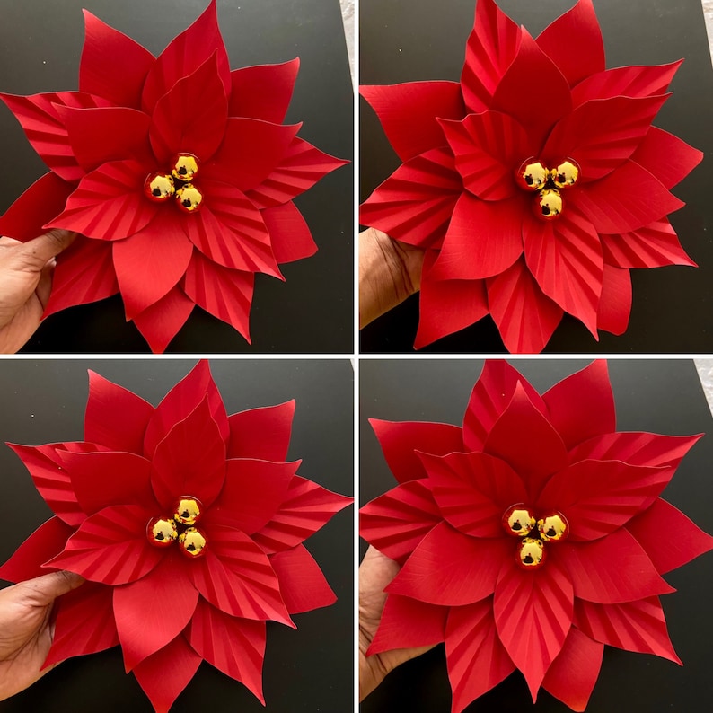May include: Four red paper poinsettia flowers with gold glitter accents. Each flower has a cluster of three gold glitter balls in the center.