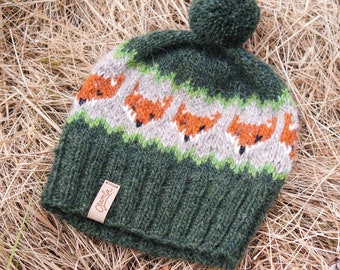 Hat with foxes and a large Pompom. Authentic Icelandic wool warm hat. handmade With 100% pure icelandic wool, Unisex