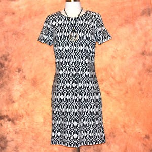 black and white aztec print trim long sleeve mini dress Aztec Print V Neck Knotted Mini Dress