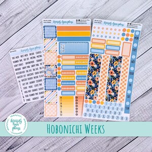 May include: A collection of planner stickers in various designs, including floral, stripes, and solid colours. The colour palette features blue, orange, and peach. The stickers are for weekly planning and include labels and date markers. The text "Hobonichi Weeks" is visible.
