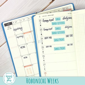 May include: Two open Hobonichi Weeks planners with blue covers, displaying grid-lined weekly calendar pages for November and June 2020. The pages feature handwritten text like meeting, happy mail, and daily stats, alongside printed labels.