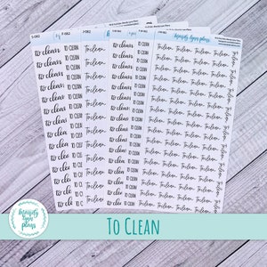 May include: A sheet of clear stickers with the phrase "To Clean" repeated multiple times in black cursive writing. The stickers are designed for use in a planner or journal.