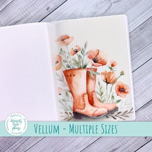May include: A vellum page with a watercolor illustration of orange rain boots filled with orange poppies and greenery. The text "VELLUM - MULTIPLE SIZES" is displayed on a teal banner at the bottom of the page.
