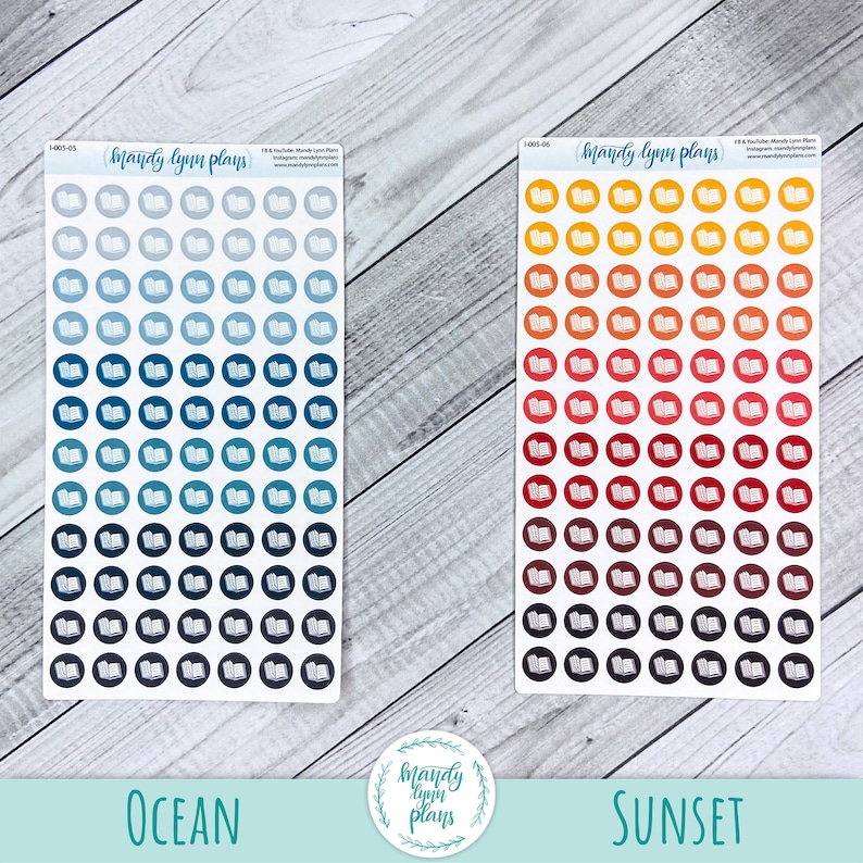 May include: Two sheets of stickers featuring an open book design. The stickers are in two colour schemes: ocean and sunset. The ocean stickers are shades of blue, teal, and grey. The sunset stickers are shades of yellow, orange, red, and brown.