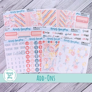 May include: A set of planner stickers with a floral theme. The stickers feature pink and blue flowers, a calendar, and various other planner-related designs. The stickers are labeled "Mandy Lynn Plans".
