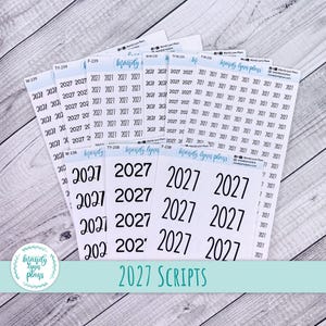 May include: Multiple sheets of adhesive planner stickers featuring the year 2027 in various black font styles and sizes. Each sheet includes the brand name Mandy Lynn Plans and specific product codes like W-239, TY-239, F-239, W-238, TY-238, and F-238.