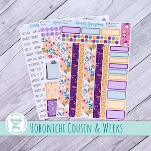 May include: Planner stickers featuring floral patterns in purple, orange, and yellow. These stickers are designed for Hobonichi Cousin & Weeks planners, with labels, boxes, and decorative elements. The stickers include text such as "This Week", "Payday", and "Errands".