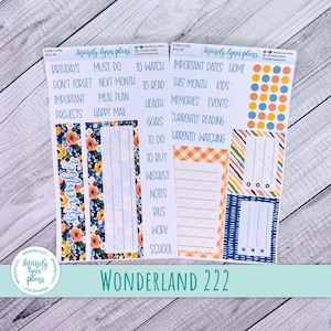 May include: Two sheets of planner stickers with various designs. One features floral patterns and the word "November". The other has colourful dots and stripes. Text includes "Birthdays", "Important Dates", and "Wonderland 222".