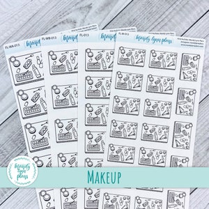 May include: A sheet of black and white stickers featuring various makeup items, including eyeshadow palettes, brushes, and bottles of nail polish. The stickers are labeled "Makeup" and are part of a collection called "Mandy Lynn Plans".