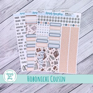 May include: Planner stickers with a soft color palette of beige, blue, and gray. The stickers include labels for appointments, dates, and decorative elements. The text "October" and "Hobonichi Cousin" are visible.