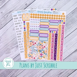 May include: A set of planner stickers with floral and geometric patterns. The stickers include labels for appointments, dates, and to-do lists. The colour scheme features shades of purple, orange, and pink. The word "July" is visible on one of the sticker sheets.