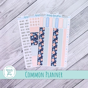 May include: Planner stickers featuring floral and striped patterns in blue, pink, and white. The stickers include labels for scheduling and planning, with text such as "This Week," "Payday," and "Errands." The stickers are labeled "Common Planner."