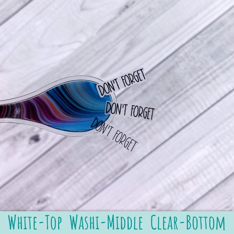May include: A clear sticker featuring a swirling abstract pattern of blue, purple, and black colors. The sticker has a rounded shape and includes the text DON'T FORGET printed three times in a black sans-serif font extending from the right side.
