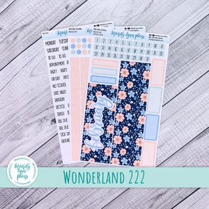 May include: Planner stickers with a floral design and the word "February". The stickers include labels for appointments, to-do lists, and a calendar. The colour scheme includes blue, pink, and white.