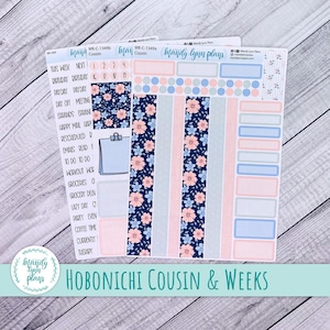 May include: Planner stickers featuring floral and geometric patterns in pink, blue, and white. The stickers include labels for tasks and events, with the text "Hobonichi Cousin & Weeks" at the bottom. These stickers are designed for planning and organisation.