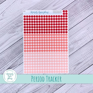 May include: A sheet of red, pink, and white dot stickers labeled "Period Tracker". The stickers are arranged in three rows of 10 dots each. The sheet is labeled "Mandy Lynn Plans" and includes a website address.