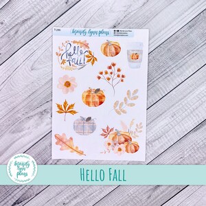 May include: A sheet of fall-themed planner stickers with watercolor illustrations of pumpkins, leaves, flowers, and a coffee cup. The text "Hello Fall" is displayed at the bottom. The stickers are designed by Mandy Lynn Plans.