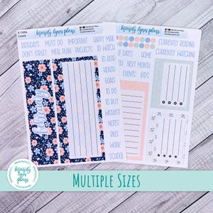 May include: Two sticker sheets with floral and list designs. One sheet has a blue floral border with the word "Cousin" and a list. The other sheet has a pink and blue design with lists and the text "Currently Reading".