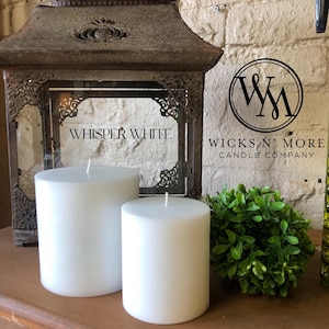 White Hand-Crafted Scented Pillar Candle by Wicks N' More
