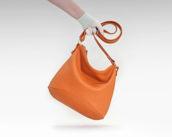 Orange leather bag, women's slouchy hobo bag, top zip purse with adjustable shoulder strap.