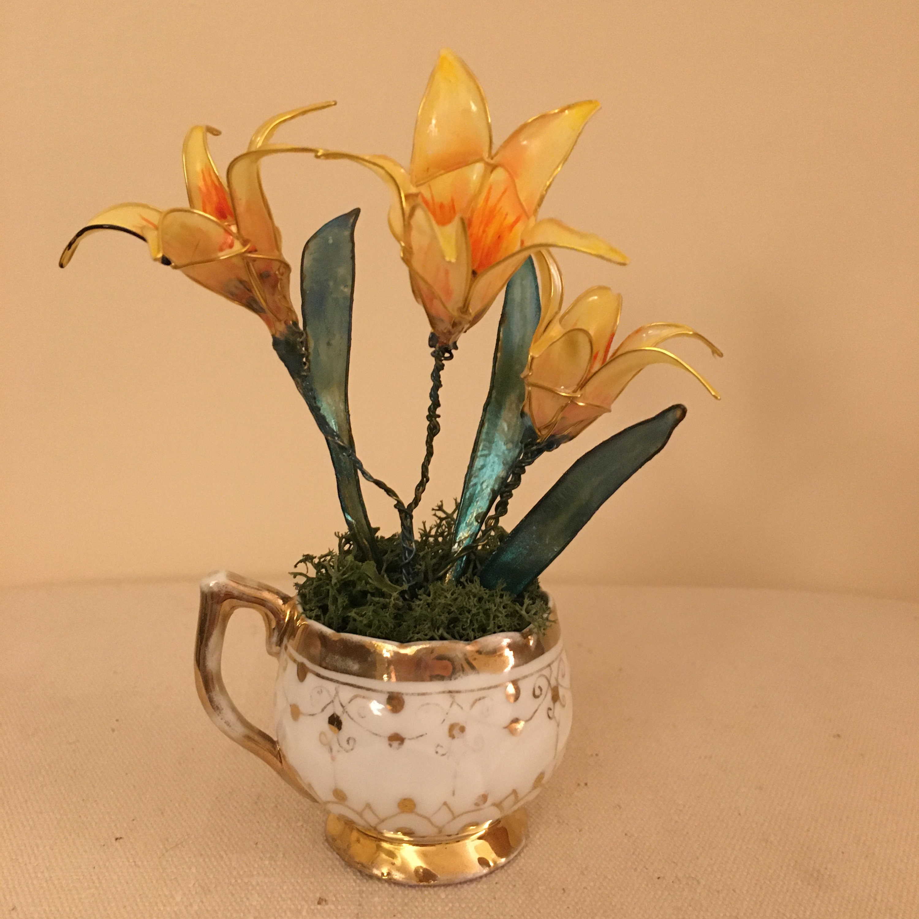 Daffodils in a white and gold ceramic pot Etsy