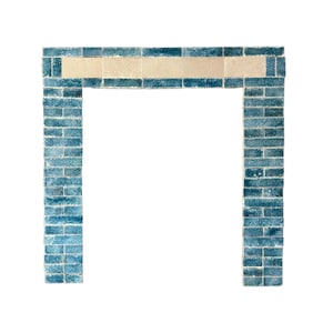 May include: A blue and white tiled fireplace surround with a rectangular opening. The tiles are arranged in a brick pattern.