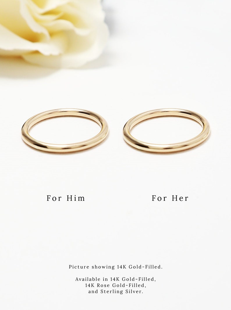 May include: Two gold-filled rings, labelled "For Him" and "For Her", are shown on a white background. The rings are simple bands. The image also includes text indicating the rings are available in gold-filled, rose gold-filled, and sterling silver.