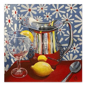 May include: A still life painting of a silver pitcher, a glass of lemonade, two lemons, a spoon, and a red table cloth. The background is a blue and white floral pattern.