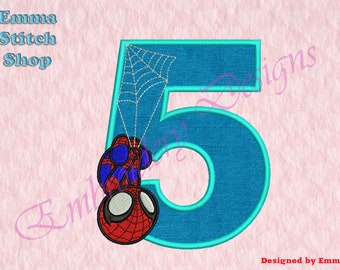 May include: Embroidered design of a blue number five with a red and black Spiderman hanging from a web. The text "Emma Stitch Shop" is in the top left corner and "Designed by Emma" is in the bottom right corner.