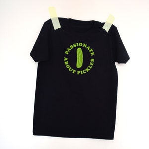 Black Passionate about pickles T-shirt, pickle lover, neon, green, typography, graphic design, logo, gherkin, text t-shirt, font image 2