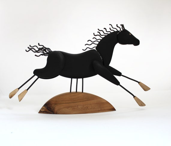 large wooden horse sculpture
