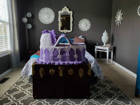 purple baby bassinet