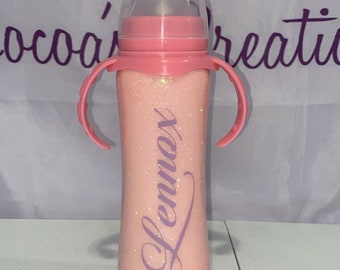 Custom baby bottles and sippy cups. Free pickup.There’s a separate listing for items needing to be shiped