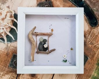 Watching the world go by, pebble art, driftwood