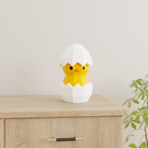 Modello di modello di decorazione pasquale con pulcino nell'uovo Papercraft 3D fai da te in carta low poly