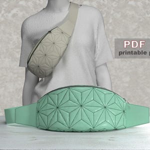 May include: A printable PDF pattern for a light green and white fan-shaped crossbody bag. The bag has a geometric pattern and is shown on a mannequin.