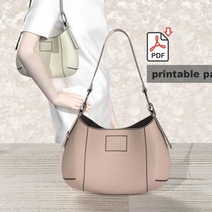 May include: Printable pattern for a light pink leather handbag with a black strap and a flap with a rectangular patch. The pattern is available as a PDF download.