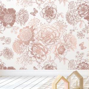 May include: A white background with a rose gold floral pattern. The pattern features various flowers, leaves, and butterflies. The design is perfect for a nursery or bedroom.