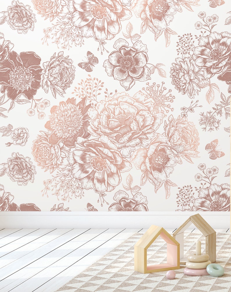 May include: A white background with a rose gold floral pattern. The pattern features various flowers, leaves, and butterflies. The design is perfect for a nursery or bedroom.