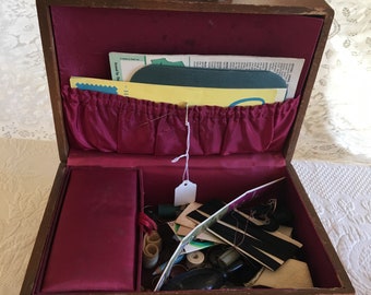 Antique Sewing Box with Dovetailed Construction, Maroon Silk Lining With Gathered Top Pouch and Lidded Section. Black Darning Egg, Scissors.