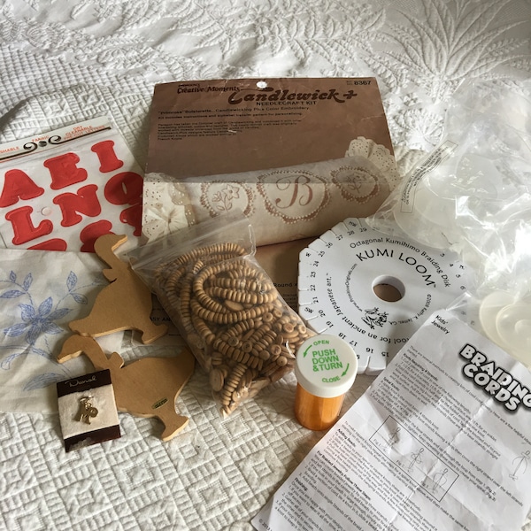 Grab Bag Crafting Supplies. Plastic Spool Tops, Kumi Loom, Wooden Beads, Adhesive Snoopy Letters EJ & T, 2 Wood Geese, Iron On Letters, Etc.