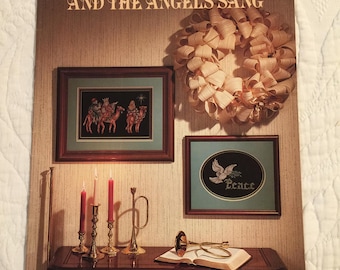 Punto de cruz contado Y los ángeles cantaron Stitchery. Colección Stoney Creek. Ángeles, paloma de la paz, el ratón Chris, los tres Reyes Magos y otros.