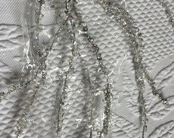 Holiday Elegance Garland of Ice. Six Strands of Iced Garland to Hang or Take Apart for Use in Crafting. Six Strands 48" Long.