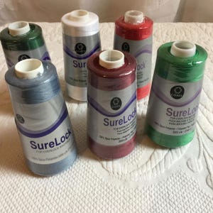 SureLock Thread 100% Spun Polyester 3000 Yards Thread for Overlock Machines, by Coats. Made in China.